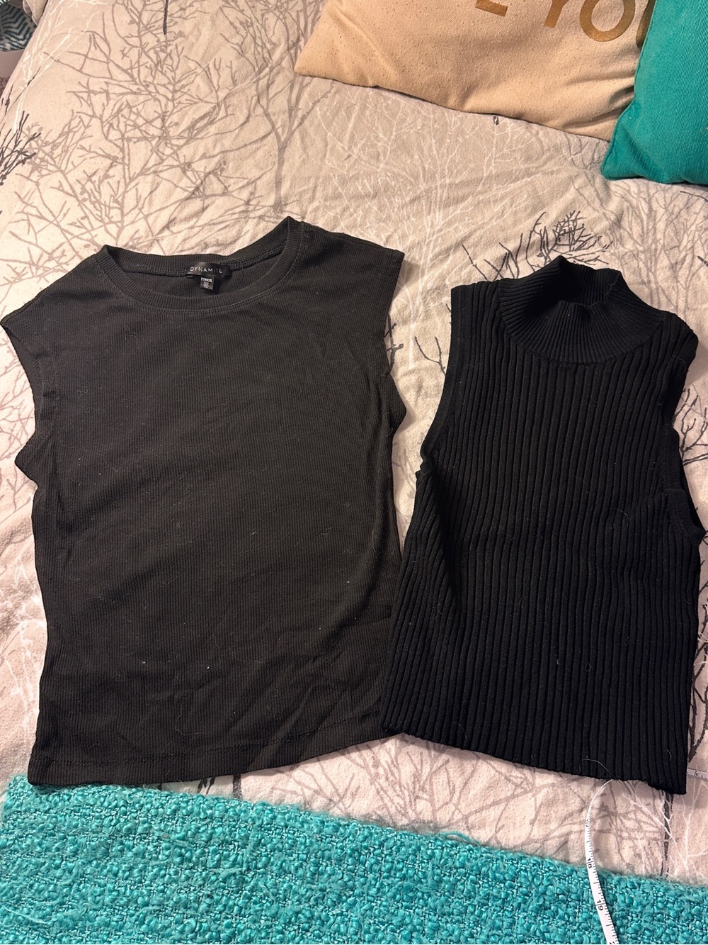 Two black dynamite sleeveless tops